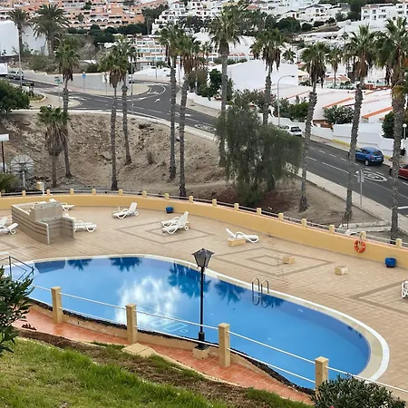 Oasis San Eugenio 1-bedroom With Ocean View, Large Terrace And Pool, Full Kitchen דירה